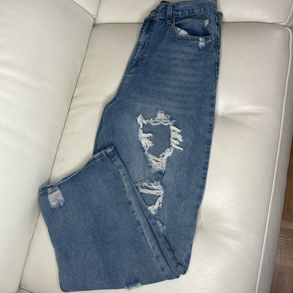 Size 11. Fashion Nova medium wash distressed boyfriend jeans.
